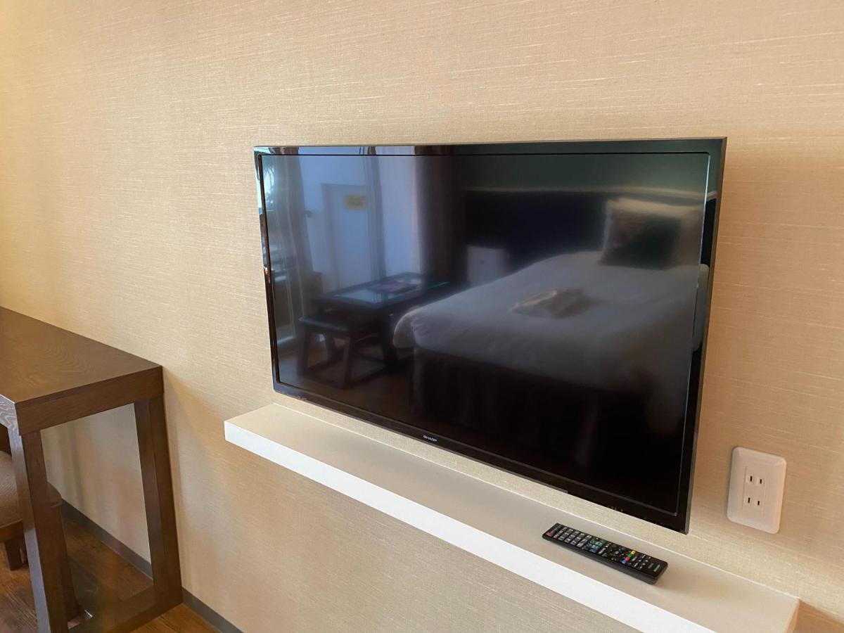 サンセットビーチホテル Chatan Extérieur photo